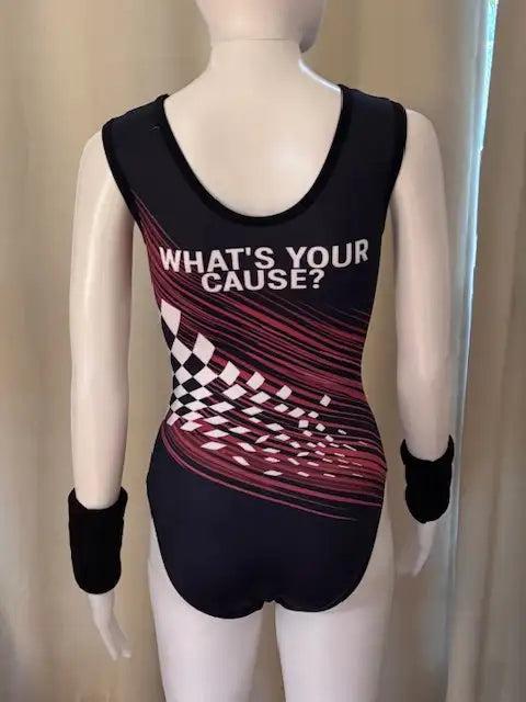 Black sleeveless leotard with a bold red and white checkered pattern radiating from the waist, featuring the text ’what’s your cause?’ across the back.